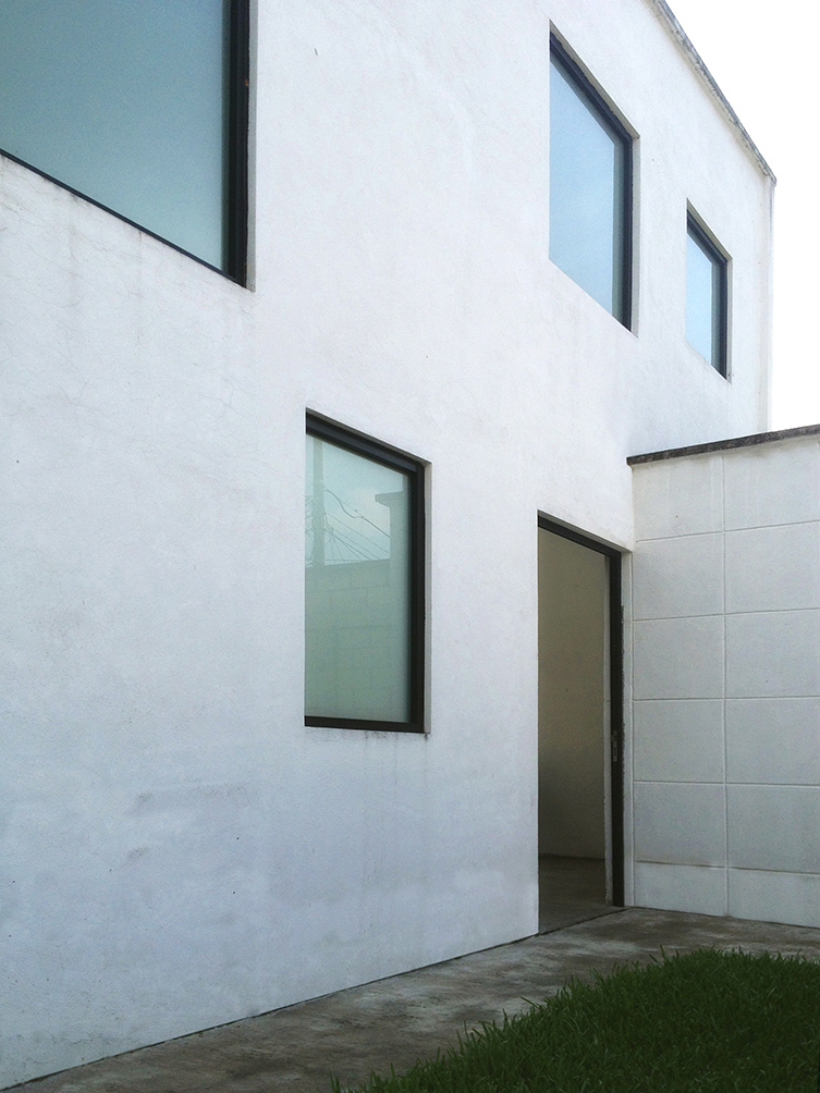 MOLCAJETE Arquitectura Casa c+m fachada entrada